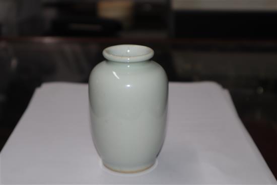 A Chinese small blue and white vase painted with a luohan H.10cm